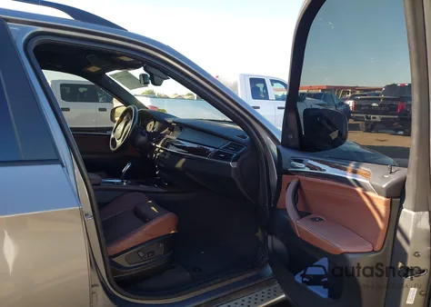 2012 BMW X5 xDrive50I z USA, uszkodzony, nr VIN 5UXZV8C59CL423305